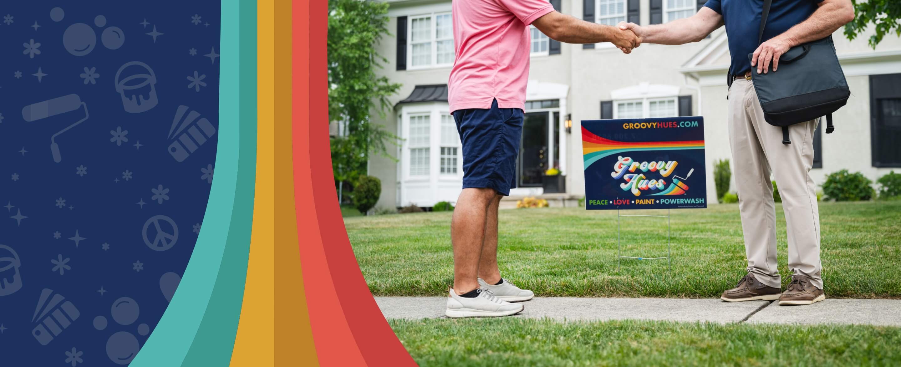 Two men shaking hands in front of freshly painted home